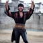 Placeholder: a young man wearing leather pants, a dirty mexico-themed poncho, bowl-cut haircut, light facial hair, full body shot, holding 2 daggers with a smile