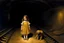 Placeholder: in a tunnel little girl is holding a teddy bear next to train tracks Leonor Fini