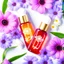 Placeholder: a small vial lies on a beautiful floral background top view, in the background there are beautiful spring flowers and a drop of cream, high-quality picture, top view