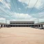 Placeholder: Photograph, wires, fake, limit of the world, edificio elicoidale, spacious parking spaces, Truman show, brutalist concrete architecture, sky, brutalist, liquid, polvere, red spot, open air museum style, blue wire, apparecchi elettronici, powder, punto, minimalist, details of the dust very accentuated, deep 3d field