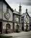 Placeholder: A gray factory with iron clocks designed in German folk art painted by Georges Seurat