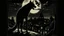 Placeholder: "Vintage Hollywood Horror Elegance: Design a classic film poster in captivating film noir style, featuring a menacing werewolf bathed in moonlight. The eerie glow illuminates a Gothic cityscape backdrop. Deliver a chilling sense of terror and suspense with chilling details, enhancing the old-world mystique of both beast and setting."