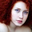 Placeholder: Woman with red curly hair and brown eyes