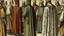 Placeholder: Rear view in 1490 of Andalusian men gathered around a commander in old Arab dress