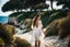 Placeholder: long shot, beautiful Turkish girl with nice blue eyes wearing a dress walks in shore toward camera , sharp focus all the scene, natural light, vertical composition, relaxed and natural, fresh and comfortable ,in seaside there are luxury beach hotels.