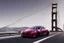 Placeholder: A Tesla 'Model S' is drifting at top speed, on the 'Golden Gate' bridge. (CINEMATIC, WIDE ANGLE LENS, PHOTO REAL)