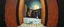 Placeholder: master oil painting by Escher and Giger, sodom in the style of Fallout 4, pinhole cam pic, dimensional door, tear