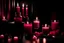 Placeholder: generate me an aesthetic complete image of pink perfume in dark room with candles