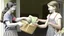 Placeholder: strung out girl receiving cash for her groceries to lady at house