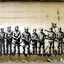 Placeholder: Banksy figures war or peace