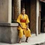 Placeholder: [very impressive high res masterpiece in Kodak Eastman 5247, bokeh scene by Stanley Kubrick] Elizabeth Montgomery, the Shaolin gangsta monk covered by tattoos, waiting outside in a yellow kimono on a stone doorstep. Her presence is striking, the tattoos on her knuckles adding to her intimidating aura. With a fierce glare, she menaces the camera with her two fists, each knuckle etched with intricate designs symbolizing her journey and battles fought.