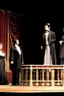 Placeholder: llustrate the presidential box on the balcony level, portraying Abraham Lincoln, his wife, and their guests as they enjoy the play. Highlight the vulnerability of Lincoln without proper security, setting the stage for the impending tragedy