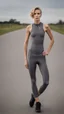 Placeholder: photography of a beautiful anorexic woman, grey satin triathlon top, sports illustrated, blond short wavy bob haircut, pronounced sternum, flat chest, anthracite cycling leggins