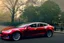 Placeholder: A Tesla 'Model Y' is drifting at high speeds, in 'Central Park' in New York City. (CINEMATIC, WIDE ANGLE LENS, PHOTO REAL)