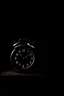 Placeholder: Alarm clock in a dark room illuminated at six in the morning