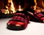 Placeholder: Red plaid slippers, fur black rug,log cabin fireplace, night