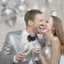 Placeholder: Photograph of a happy couple celebrating with silver party decoration.