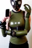 Placeholder: Steam-punk style random-mask. Large fencing mask covers chin and cheeks. Hot girls. Reflective surface on face, full coverage, reflective. Camera lenses as eyes. Head full of integrated old-fashioned cameras and phone. Army green surfaces body, latex. Perfect body, thick thighs and calves. Asa Akira's body. Wide hip, skirt bleats nicely. Partly symmetrical. Straitjacket. Rusty and decayed background. Steam-plunge air-bottles. Euclidean 3D-tiling walls. surrealistic. Oppressive atmosphe