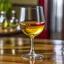 Placeholder: wine glass filled with piss