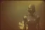 Placeholder: steampunk, vintage analog polaroid of a woman robot, female body, fog, lomography, heavy film grain, night, color bleed, depth of field, bokeh, retro