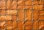 Placeholder: canvas background covered with a grid of many rectangular weathered faded tan leather patches that are each stitched (brown) and nailed (brass) around the edges