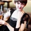 Placeholder: Russian boyish boylike female figure short man's haircut boyish face boyish features in black girlish lacy cocktail dress earrings in restaurant