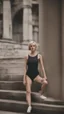 Placeholder: beautiful anorexic woman, total shot, short shiny black triathlon swimsuit, short blond wavy bob hair, blurred concrete background