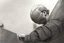 Placeholder: a swedish industry worker from sweden, very strong man pushing a ball,very basic sketch painting like the image i uploaded, lead pencil