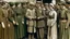 Placeholder: Andalusian men and women gathered around a military commander in Arab uniform