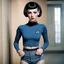 Placeholder: full body portrait -- an absolutely stacked, thin, petite, little female, who resembels Spock, with great big giant bazoombas, short, military-cut, buzz-cut, pixie-cut black hair tapered on the sides, wearing short sleeved, nylon, Turtleneck tube top, blue jean mini shorts, heavy, black fishnet stockings, punk rock styled, platform boots, red lipstick, dark, emo, eye makeup