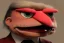 Placeholder: Angry muppet trump in suit, no tongue, looking forward, face, small, round puffball nose, eyebrows