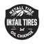 Placeholder: logo for a shop that installs tires and does oil changes, inside a shield shape, in the style of national parks stickers