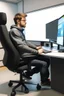 Placeholder: a guy watching a youtube sitting in a office chair