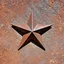 Placeholder: rusty downward metal star