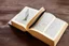 Placeholder: Floating magical book being held by magic