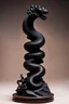 Placeholder: an ominous small statuette made of ebony in the form of a mountain with the snake slithering around the mountain