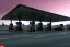 Placeholder:  highway gas station ,country, night lighting , realistic, unity engine, cinematic lighting, scriptable render pipeline.