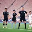 Placeholder: Nahomi Kawasumi in a referee jersey officiating for a soccer match at Wembley Stadium