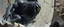 Placeholder: epic fantasy illustration, black giant throwing pushing marble stone sculpture into wall