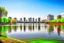 Placeholder: Sunny day, distant modern city, lake, lake reflections, people