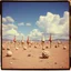 Placeholder: Strange spindle-shaped objects of various shapes, scattered over an arid wasteland, clouds, Max Ernst, Audubon, Amano, Walton Ford, Yves Tanguy, bright colours, polaroid, 8k, 3d, 33mm photography, well defined