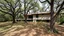 Placeholder: Nestled among centuries-old trees, stands a house whose brutalist design blends into the landscape, a tribute to the unrelenting beauty of the primitive.