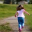 Placeholder: little girl running in