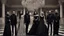 Placeholder: goth fashion, women and men in goth clothes and jewelry, at an elegant party in a grand ballroom. Group photo. high detailed, sharp focus, looking at the camera, cinematic, masterpiece, high realistic, perfect photo