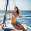 Placeholder: she is a skipper in swimsuit . she drives the sailing boat, she leans forward to get the rope, she looks at the camera with a smile