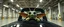 Placeholder: car driving happy 2d insect anime fluffy slimy alien gremlin man in the style of Escher and Giger and Fallout 4, pinhole cam, airbrush 3d rendering, on tv screen:A five-second cinematic single take in a clean industrial presentation hall.