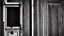 Placeholder: unhinged door, anime, monochrome, black background, ink, simple, maximum quality, broken hinge, barely functioning, why is it still being used it's a health hazard