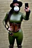 Placeholder: Steam-punk style random-mask. Large fencing mask covers chin and cheeks. Hot girls. Reflective surface on face, full coverage, reflective. golf ball eyes. Head full of integrated old-fashioned cameras and phone. Army green surfaces body, latex. Perfect body, thick thighs and calves. Asa Akira's body. Wide hip, skirt bleats nicely. Partly symmetrical. Straitjacket. Rusty and decayed background. Steam-plunge air-bottles. Euclidean 3D-tiling walls. surrealistic. Oppressive atmosphe