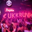 Placeholder: MR Kukrunk MC is Benny, and "DJ Roy" in a disco, dancing, "Kukrunk" on sign wall, disco light, strobe, disco ball, 1000 dancing people