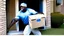 Placeholder: suspiciously looking Tyrone sneaking away holding small box from apartment mailboxes